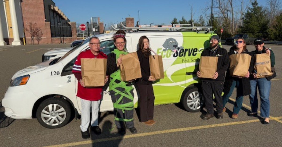 Team members wrapping and organizing gifts for distribution 