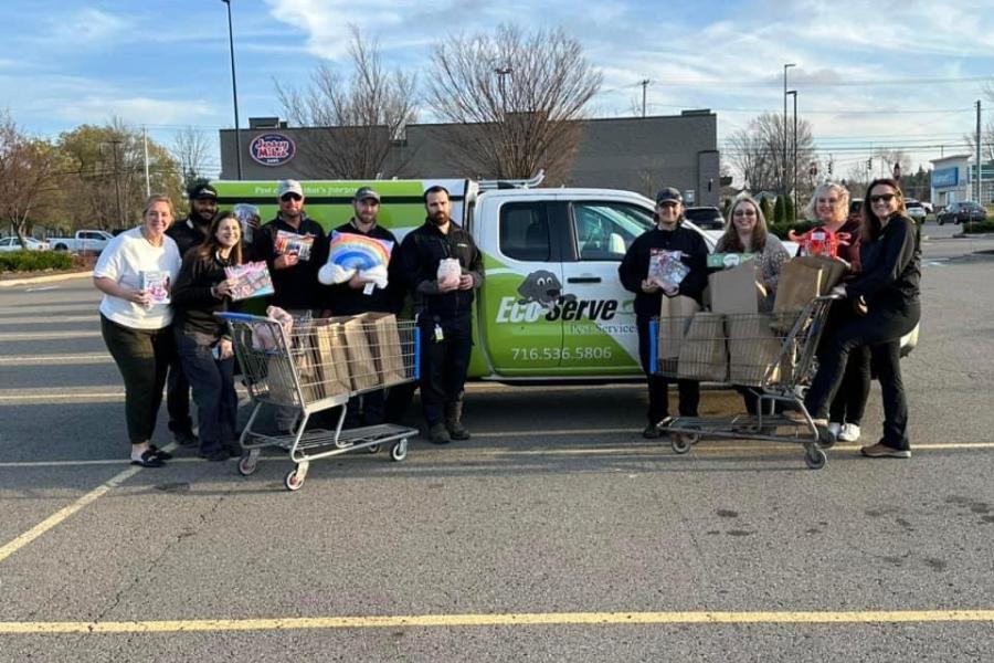 Eco Serve Team Outside with Presents