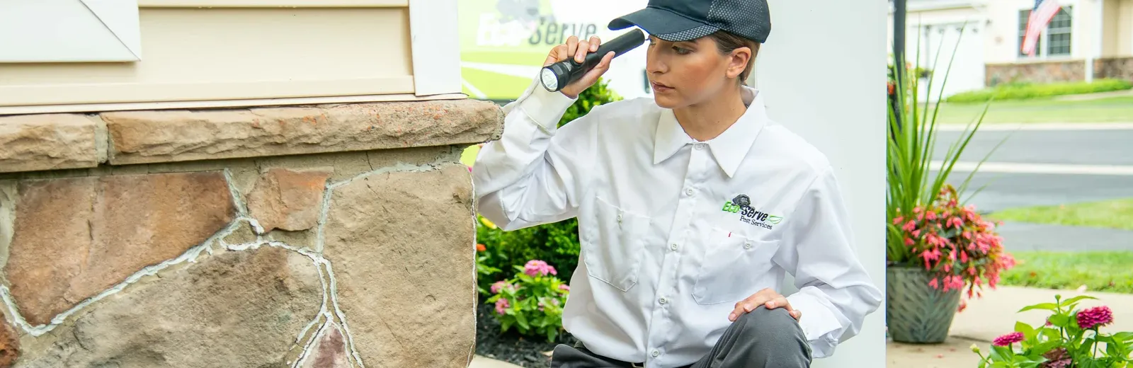 Eco Serve Technician inspecting home