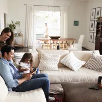 family sitting in living room