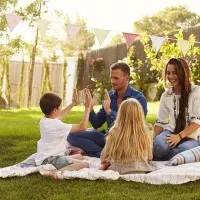 family sitting outside