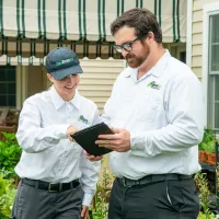 eco serve employees talking outside of home