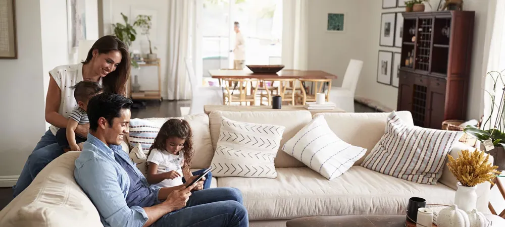 family sitting in living room