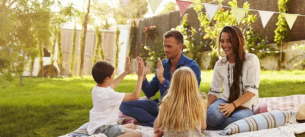 family sitting outside