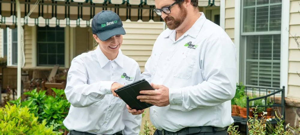 eco serve employees talking outside of home