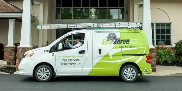 Van in front of commercial building